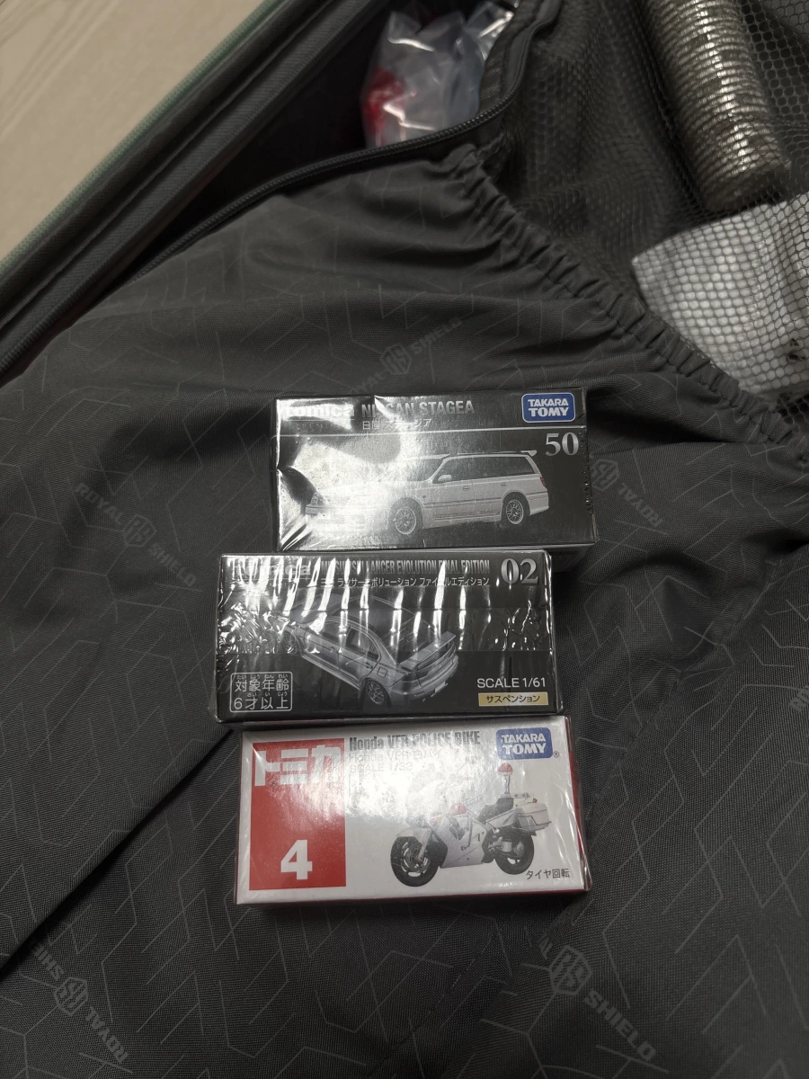 Tomica Premium No. 50 Nissan Stagea 模型車、Tomica Premium No. 02 Mitsubishi Lancer Evolution Final Edition 模型車等